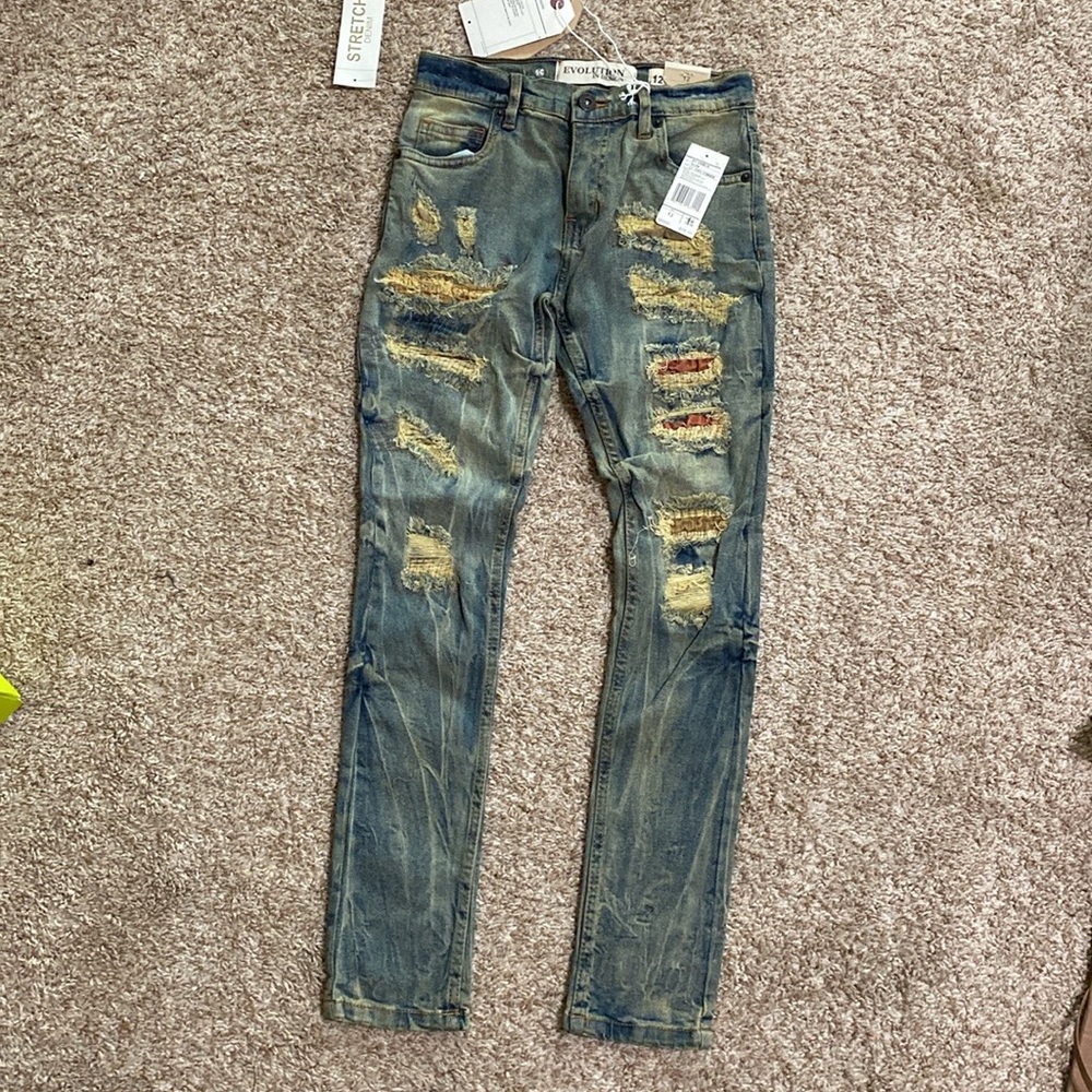 Boys Mid rise. Slim from hip to ankle distressed jeans size 12